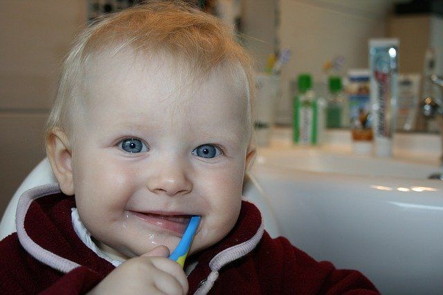 Brushing teeth at a young age 