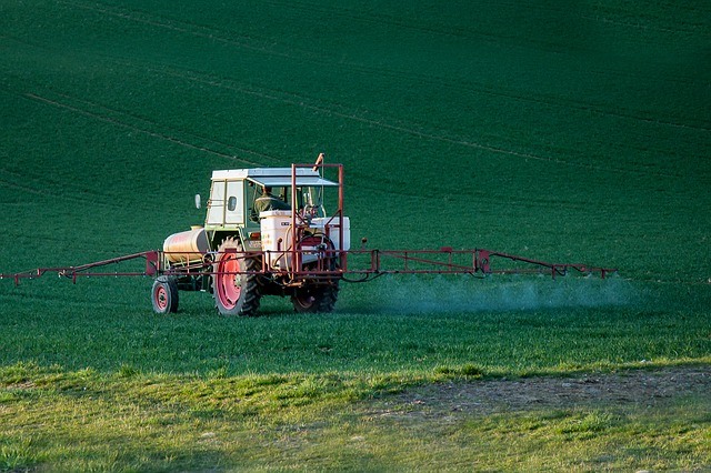 Spraying the field with pesticides