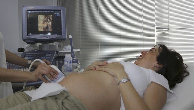 Pregnant woman having an Ultra-Sound test